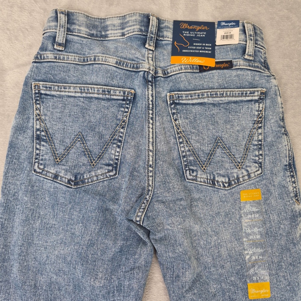 Wrangler Women's Light Blue Acid Wash Boot Cut Jeans